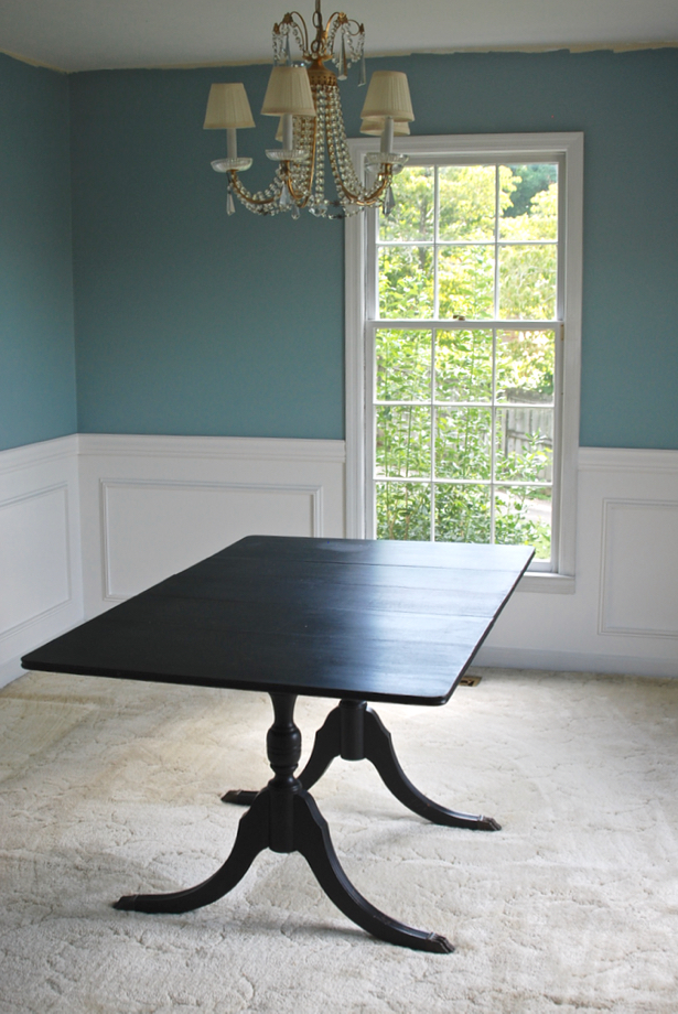 Empty table in blue and white dining room, showing wainscoting. Learn the tricks to DIY Wainscoting