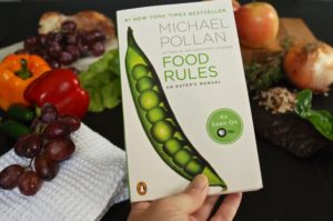 Read Food Rules by Michael Pollan to help you develop a healthy eating philosophy. You will be inspired by his food rules to eat clean and develop healthy eating habits.