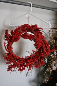 Try these 5 holiday storage hacks to organize your Christmas decor. Hang wreaths, flags, and garland.