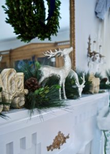 My Southern Christmas Mantle with long-leaf pine and boxwood garland and reindeer