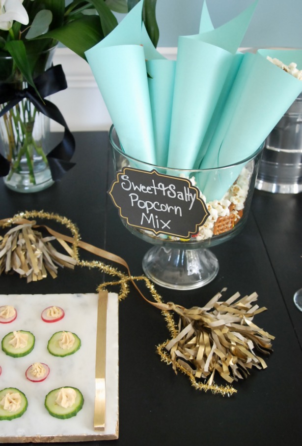 Make a sweet and salty popcorn mix using SkinnyPop's naturally sweet popcorn for a great party snack.