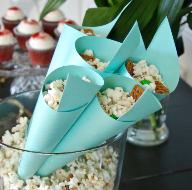 Make a sweet and salty popcorn mix using SkinnyPop's naturally sweet popcorn for a great party snack.