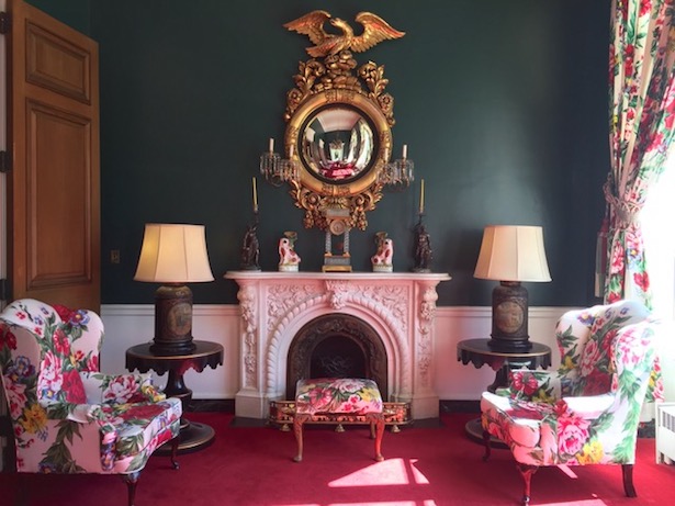Staffordshire spaniel figurines decorate the mantle at the Greenbriar