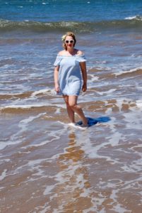 A gorgeous off-the-shoulder blue dress perfect for date night dinner or playing in the surf