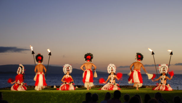 Experience the aloha spirit and Hawaiian Ho'okipa at a joyful Hawaiian luau.