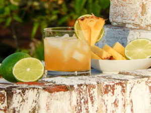 Make your Cinco de Mayo fiesta dazzle with this easy pineapple margarita on the rocks recipe.