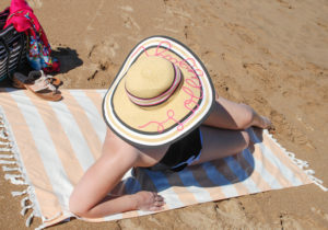 A little bit sassy, a whole lot of Southern this DIY rick-rack script sun hat is perfect for lazy days at the beach or pool!
