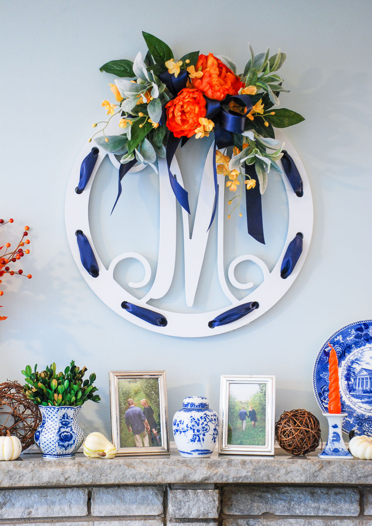 Decorate for autumn with a cheery blue and white fall mantel adorned with mini pumpkins, fall foliage, Staffordshire spaniels, monograms, and blue and white china!