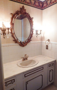 Check out our simple powder room makeover! With a coat of paint and some serious scrubbing we made quite the transformation!