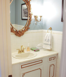 Check out our simple powder room makeover! With a coat of paint and some serious scrubbing we made quite the transformation!