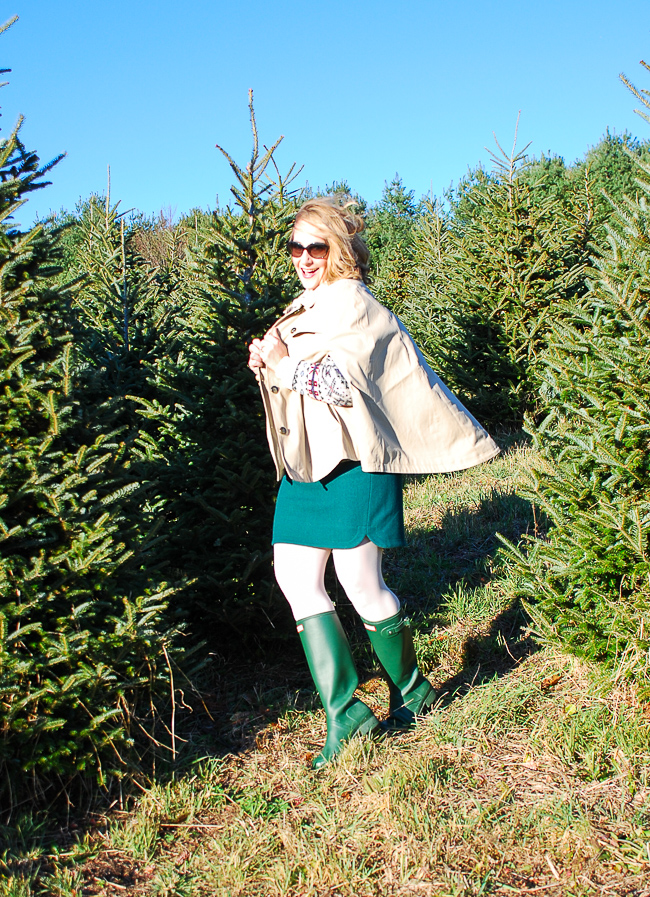A vintage ski sweater, green hunters, wool mini, and trench cape make this the perfect preppy holiday outfit for a picnic on the tree farm!