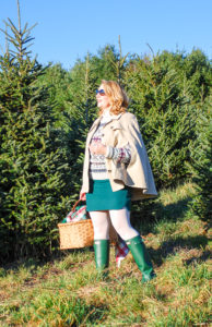 A vintage ski sweater, green hunters, wool mini, and trench cape make this the perfect preppy holiday outfit for a picnic on the tree farm!