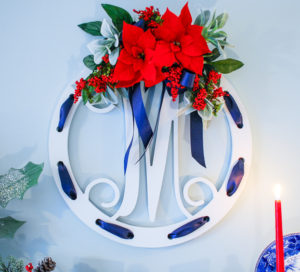 Transition your blue and white mantel decor from fall to Christmas in just a few easy steps with pops of a seasonal accent color. Switch the orange for red and decorate for two seasons with little effort!