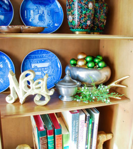 Poinsettia, juniper, paper whites, velvet ribbon, and gold accents mingle merrily in my green & gold Christmas living room!