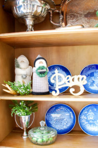 Poinsettia, juniper, paper whites, velvet ribbon, and gold accents mingle merrily in my green & gold Christmas living room!