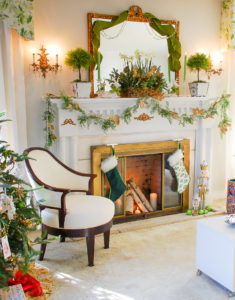 Poinsettia, juniper, paper whites, velvet ribbon, and gold accents mingle merrily in my green & gold Christmas living room!