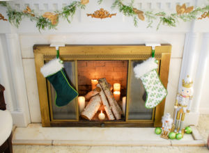Poinsettia, juniper, paper whites, velvet ribbon, and gold accents mingle merrily in my green & gold Christmas living room!