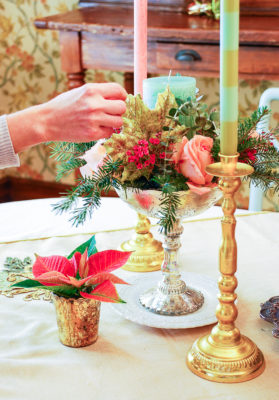 Embrace the unexpected this holiday season with a whimsical-glam Christmas table bedecked with mixed metals, pink and green hues, Arté Italica dinnerware, poinsettia, and fanciful ornaments.