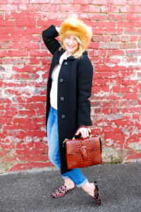 All the promise of fashion - winter outfit with fur hat - just because #foxfur #vintagewoolcoat #cashmere #boyfriendjeans #mules