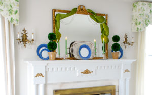 How to create a traditional mantel using boxwood topiary decor for everyday decorating.