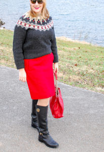 Wrap yourself in a stylish wool on wool outfit to beat the bitter winter weather. #winteroutfit #redskirt #fairislesweater #modernclassicstyle