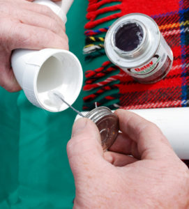 Step to glue PVC pipes together for this DIY outdoor Christmas decoration - PVC joy sign.