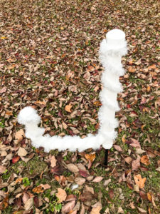 Letter J wrapped in tinsel - PVC Joy sign - easy DIY outdoor Christmas decoration