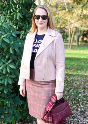 5 winter plaid pieces you need in your wardrobe - blonde woman wearing pink moto and graphic tee