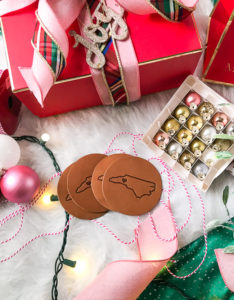 We love these leather coasters from Oowee products. Made in Asheville, NC.