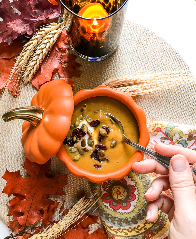 Butternut squash soup in a pumpkin dish - jazz up pre-made soup for an easy holiday hosting hacks