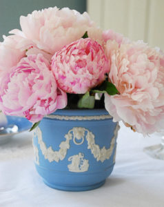 Gracious living and Southern hospitality at its finest with a Wedgewood vase filled with pink peonies.