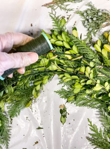 DIY Christmas wreath tutorial- finish wreath by creating hanging loop on back