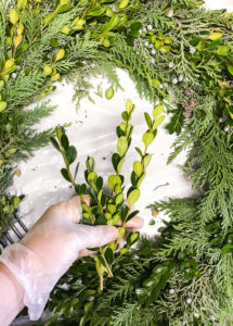 DIY Christmas wreath tutorial - how to create a hand of greenery