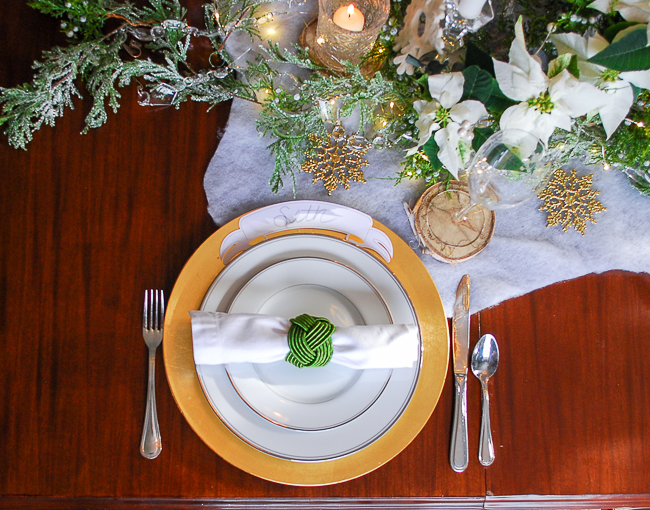 Winter tablescape tutorial - place setting in white, gold, and green