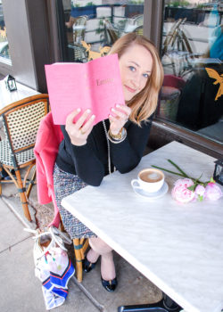 10 novels for the rosy romantic - woman at cafe reading book with latte and peonies in pearls and tweed