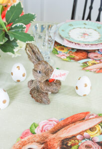 Little straw bunny surrounded by polkadot Easter eggs for a bit of whimsy on this Easter brunch table