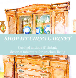 watercolor image of Regency style china cabinet with text overlay: shop my china cabinet. curated antique and vintage decor and tableware for gracious living