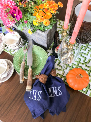 Navy monogrammed napkins add that special touch to this Southern autumn table