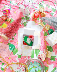 Fill advent mini-present boxes with treats