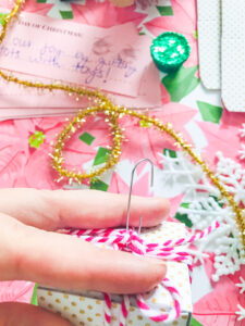 Use ornament hook through bow to hang advent mini-present box