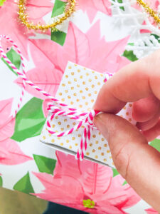 Wrap string around boxes and tie a bow on top