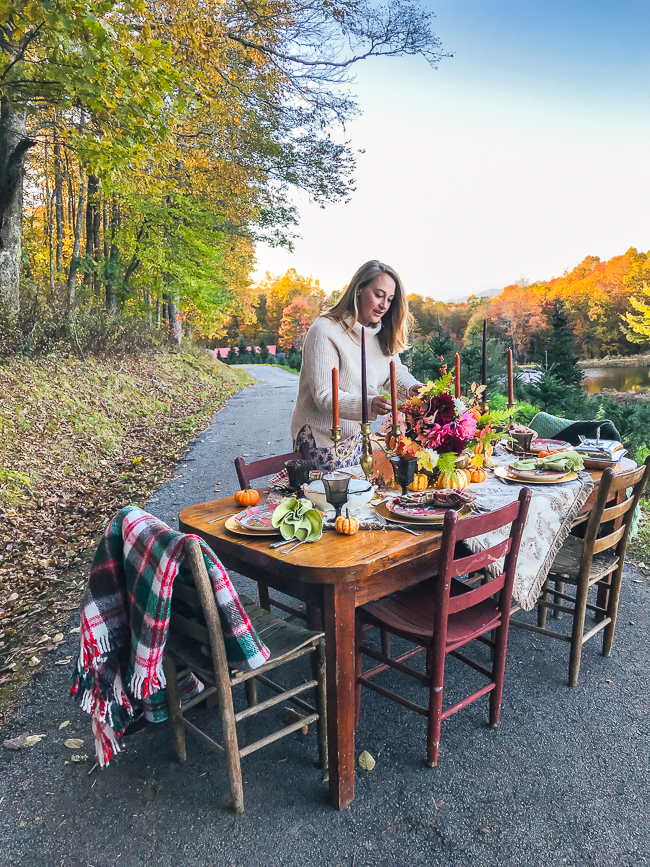 Katherine of Pender & Peony arranges florals on this Thanksgiving Table.