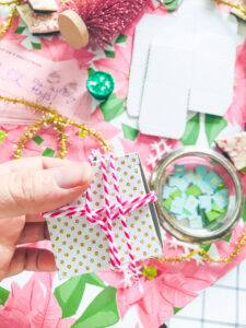 Wrap string around boxes and tie a bow on top