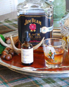 Close up view of Jim Beam Black and sassafras and sorghum bitters
