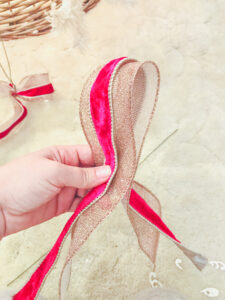 Pinch ribbons together to make pouf