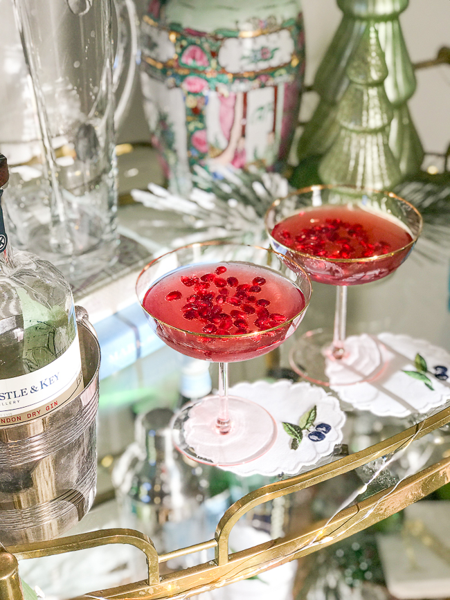 2 glasses of pomegranate gin cocktails perfect for holiday entertaining