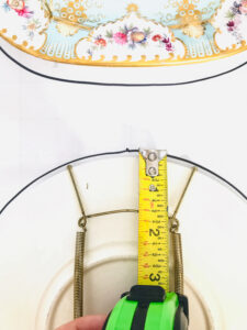 Measure space between top of plate and hanger