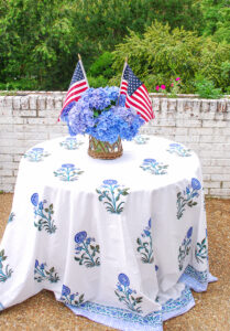 Patriotic tablescape with Indian block print cloth and blue hydrangeas