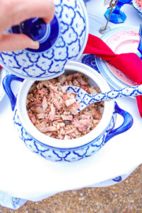 A tureen filled with Carolina BBQ chopped