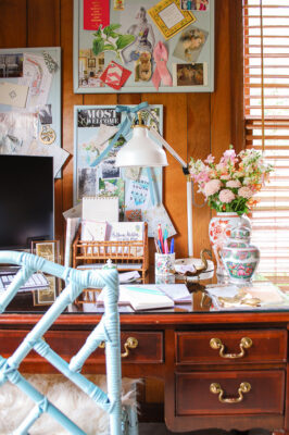 Home desk with fresh flowers, antique ceramics, inspirational boards for a successful work space to have a productive 9 to 5 at home from an introverted business owner and blogger